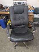 2 Rolling office chairs and one stationary chair