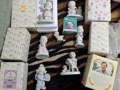 7 Precious moments figurines