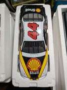 4 Revell 1:18 scale diecast replica cars: Dale Jarrett 88, Kenny Irwin 28, Tony Stewart 24 and 1997 Woody Woodpecker Chevy