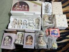 6 Precious moments figurines