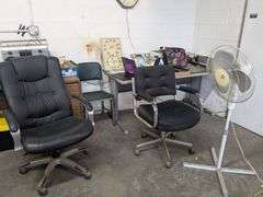 2 Rolling office chairs and one stationary chair