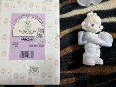 7 Precious moments figurines