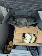 Three gray tubs with security system