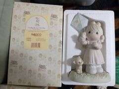 7 Precious moments figurines