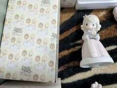 7 Precious moments figurines