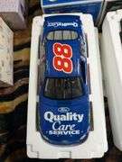 4 Revell 1:18 scale diecast replica cars: Dale Jarrett 88, Kenny Irwin 28, Tony Stewart 24 and 1997 Woody Woodpecker Chevy