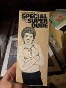 Poster, model ship, novelty item for a Super Special Dude
