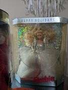 4 Barbie dolls