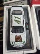 3 Revell 1:18 scale diecast replica cars: Lake Speed Cartoon Network, 1 Monte Carlo and 41 Kodiak