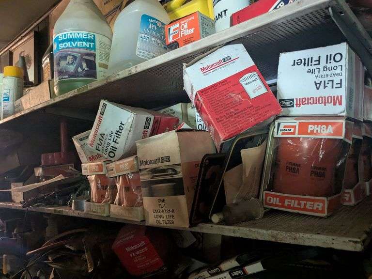License plates, oil filters, pipe thread sealers, plastic pipe cement and misc. chemicals image
