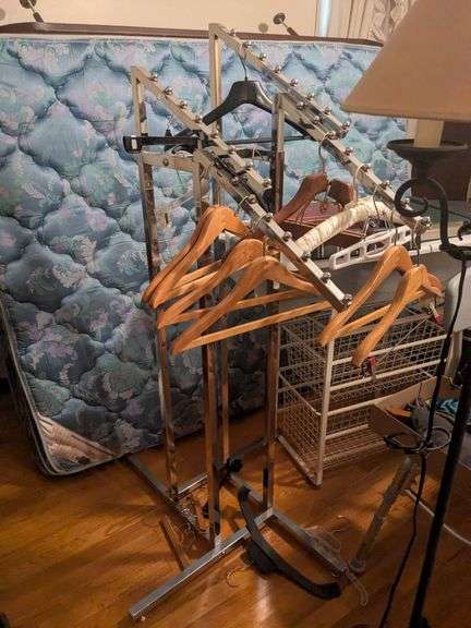Retail store clothing rack with hangers image