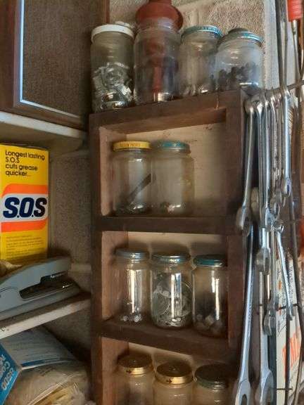 Shelf and contents: 10+ crescent wrenches, nuts and bolts