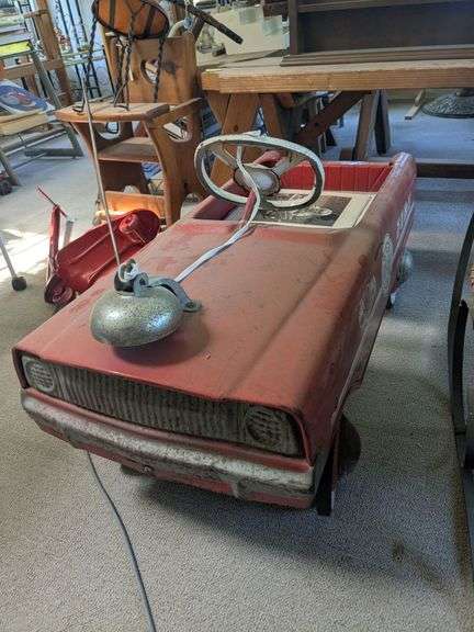 Viktor Schreckengost Metal firechief pedal car, with a book about the designer, and print image