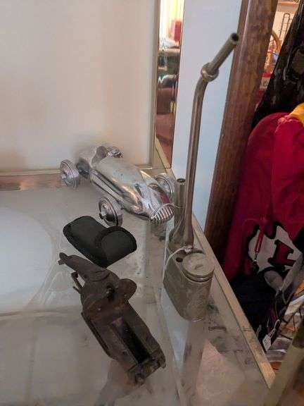 Vintage chrome 3 piece water pipe, aluminum racer, antique shotgun part, and multitool image