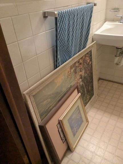 Bathroom contents, metal bucket, plunger, wall decor and misc. image