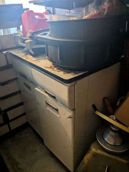 Cabinet (37" x 30" x 20"), gas can and misc. image