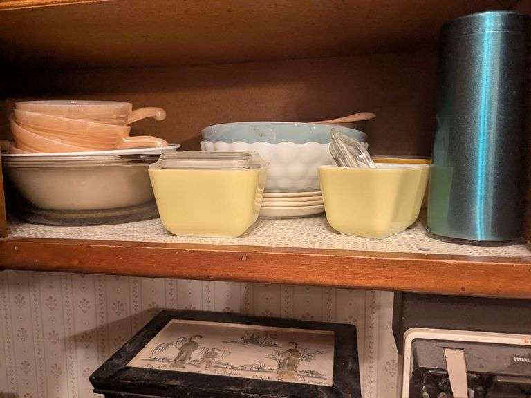 Bottom shelf: bowls, soup bowls, pyrex storage dishes, platters and misc. image