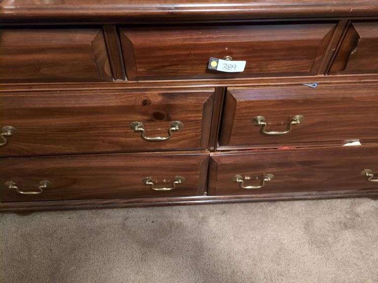 Dresser (34" x 62" x 20") w/mirror (32" x 30") and contents