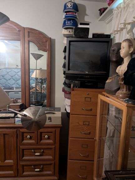 Filing cabinet, JVC 20" TV, Toshiba VHS player, VHS rewinder and International hats with stand image