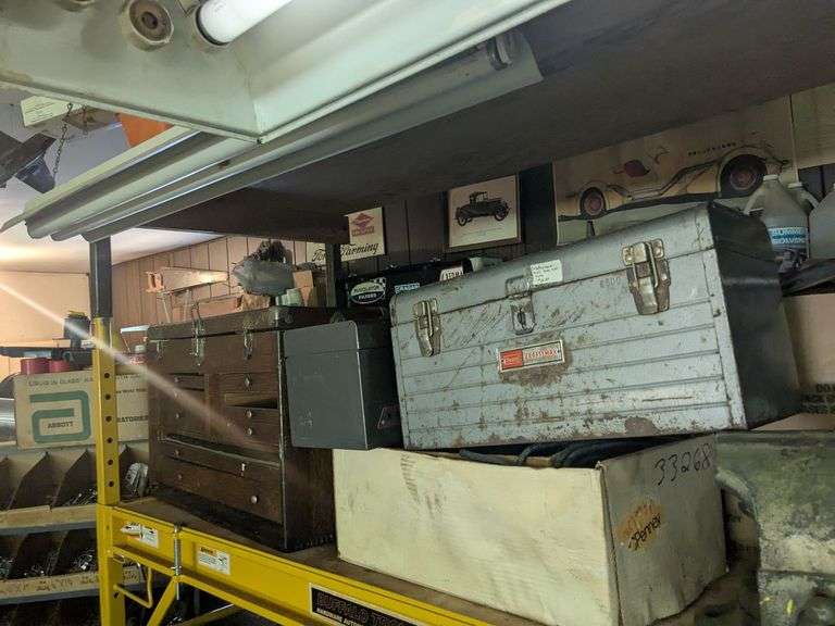 4 metal toolboxes, 1 wooden toolbox, plastic fishing box, misc image