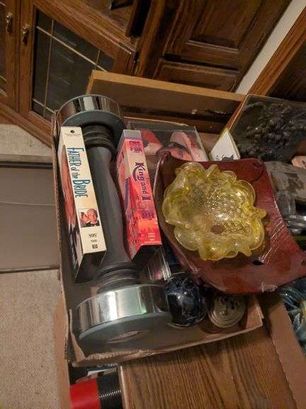 Sodalite sphere, shake weight, glass ashtray, VHS tapes, CDs and misc image