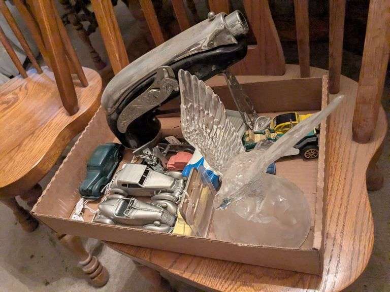 Arcor toys 1938 Oldsmobile, WWII sterling 225th infantry pin, glass bird, Laufer vw rubber car, pewter 1935 Auburn speedster, pewter 1937 cord, and misc image