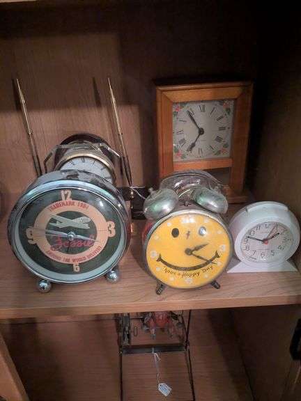 Howard Miller desk clock, smiley face clock and moany more! image