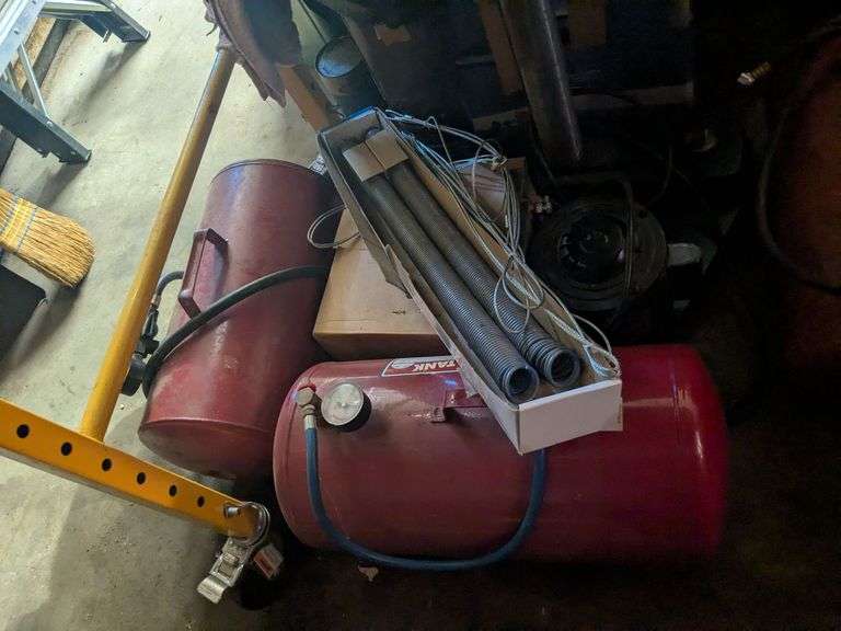 2 portable air compressors. garage door springs, garage door motor image