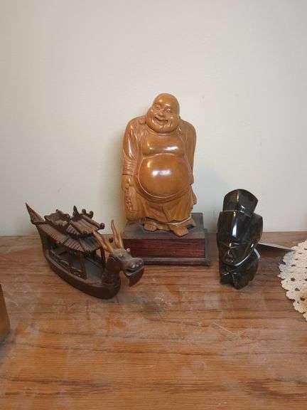 Wooden buddha carving, wooden oriental dragon boat, obsidian figurine image