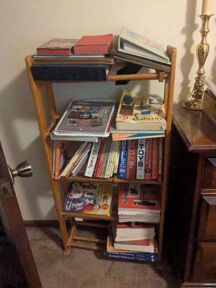 Rack and books: bible, collector books and picture albums image
