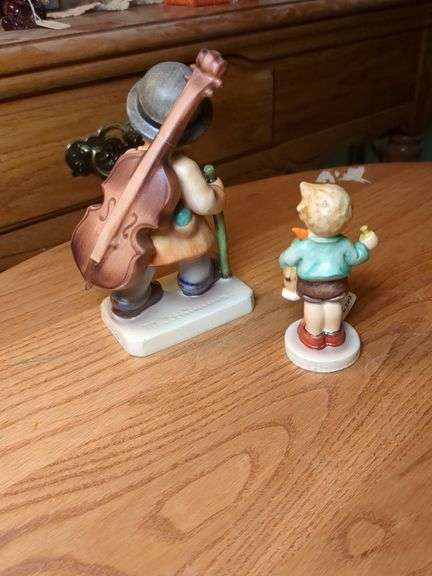 2 Hummel figurines: Boy w/ horse {chipped), Little cellist