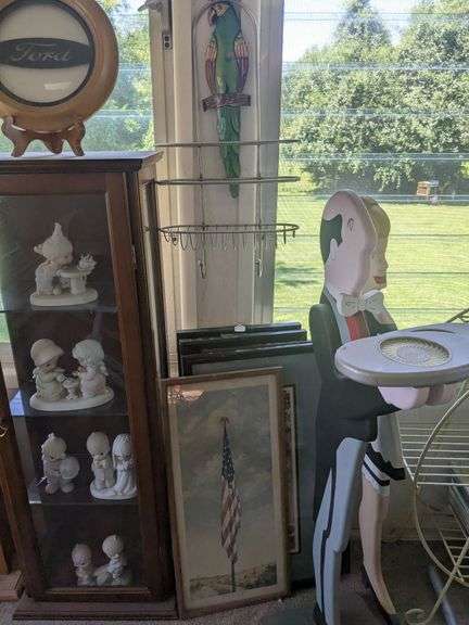 5 pieces of wall art, 2 of them are Alphonse Mucha, shower caddy with parrot image