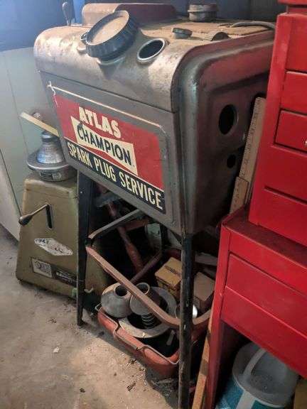 Vintage Atlas champion spark plug service machine and box of misc metal image