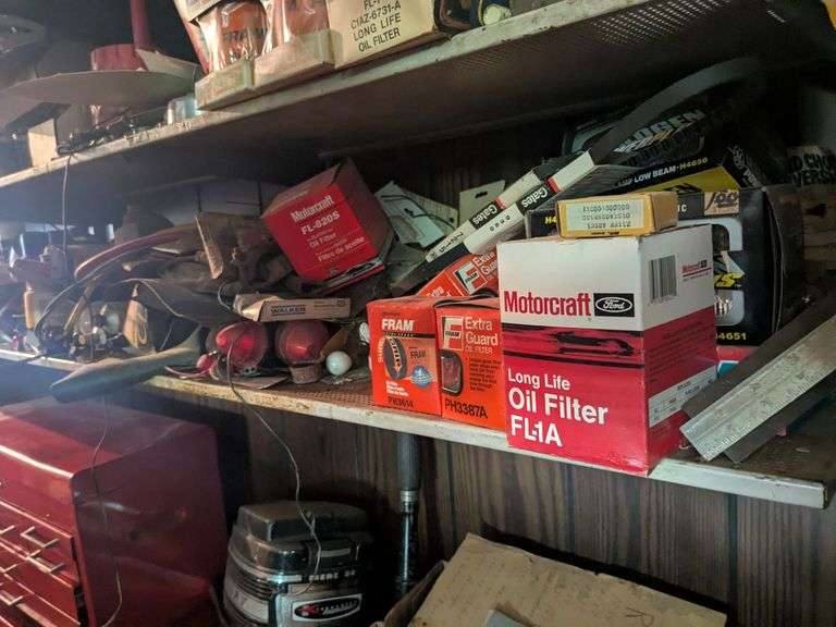 Motorcycle oil, oil filters, headlight, misc. parts and chemicals image