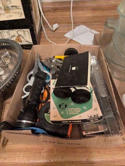 Tape measures, scissors, flashlight, wrench and misc. image