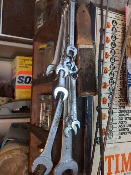 Shelf and contents: 10+ crescent wrenches, nuts and bolts
