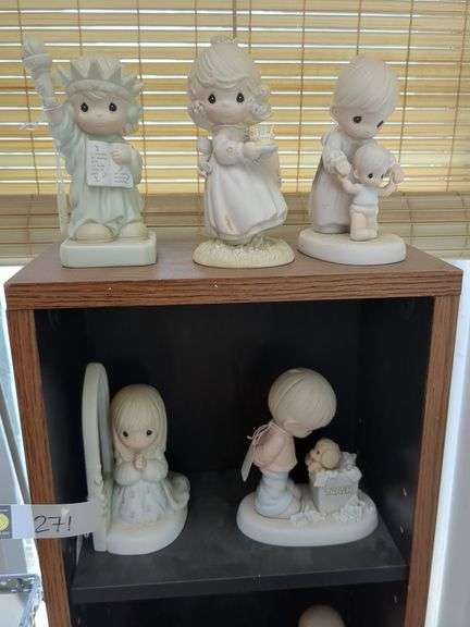 13 Precious Moments figurines, Native American pattern wall art of Navajo sand painting