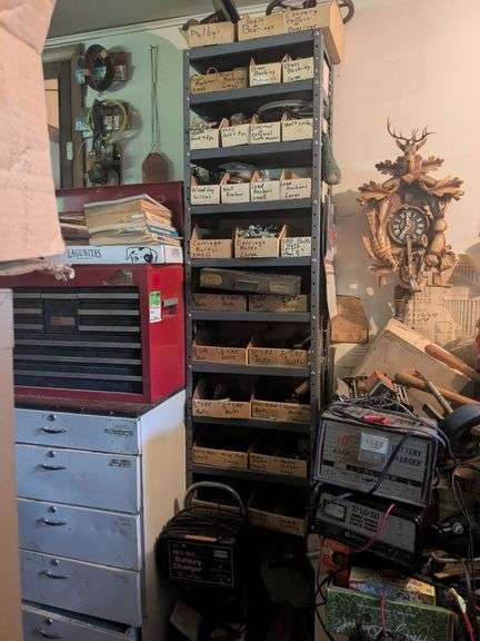 Metal shelf and contents: nuts, bolts, anchors and misc. image