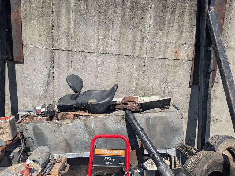 Lot of items against concrete wall image