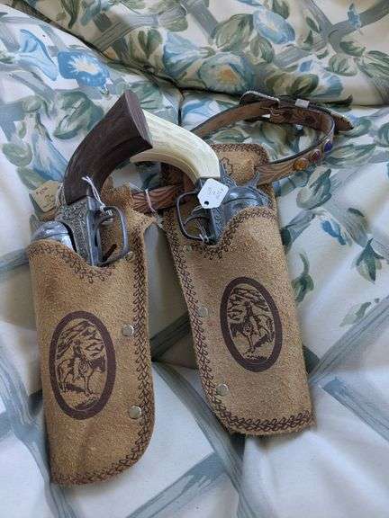 Hubley Gabriel Pony Boy Cap Pistol x2. Double tan leather holster embossed w/ belt. image