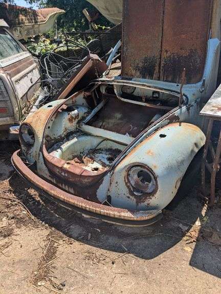 Front end of Volkswagen Beetle and scrap metal image