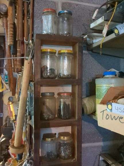 Shelf and contents: Allen wrenches, crescent wrenches, bolts, pins and washers