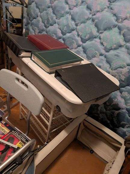 Metal organizer with photo albums and tub image