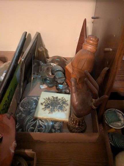Wooden womans head, hand figurine and misc. image