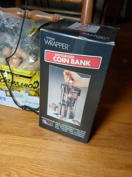 Coin sorter and coin wrappers