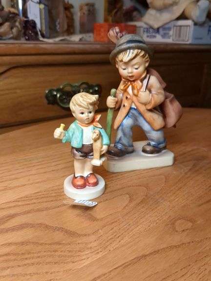 2 Hummel figurines: Boy w/ horse {chipped), Little cellist image