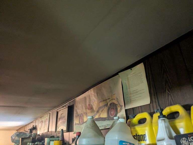 3 hand saws and 3 pieces of wall art image