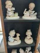 13 Precious Moments figurines, Native American pattern wall art of Navajo sand painting