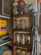 Shelf and contents: 10+ crescent wrenches, nuts and bolts