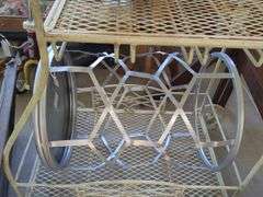 White metal cart, wooden cutting board, and metal table, 3 wall art/stained glass